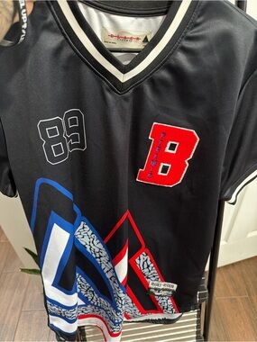 Black Pyramid Black Jersey with Red 'B' and Blue Graphic Accents